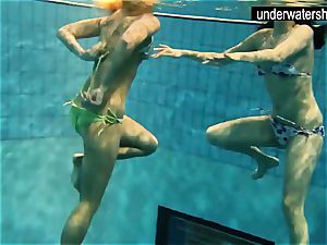 two sexy amateurs flashing their bodies off under water